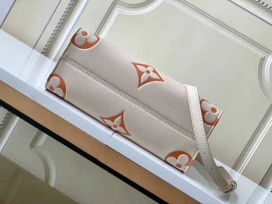 Kremowa szafranowa gigantyczna torba z monogramem OnTheGo MM Louis Vuitton na iPada Mini