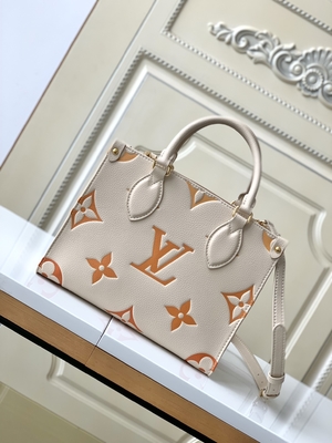 Kremowa szafranowa gigantyczna torba z monogramem OnTheGo MM Louis Vuitton na iPada Mini