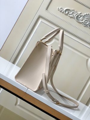 Kremowa szafranowa gigantyczna torba z monogramem OnTheGo MM Louis Vuitton na iPada Mini
