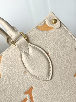 Kremowa szafranowa gigantyczna torba z monogramem OnTheGo MM Louis Vuitton na iPada Mini