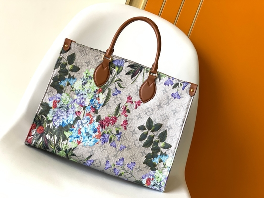 Mini torba na ramię OnTheGo MM Markowa M81724 Płótno powlekane srebrem w kwiatowy wzór