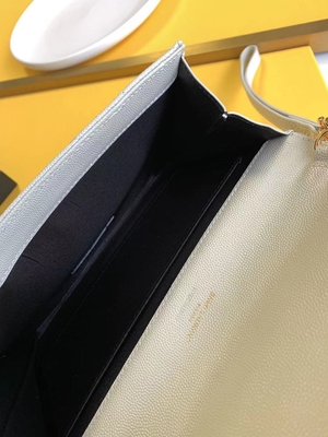 Pikowana skórzana kopertówka Caviar YSL z monogramem