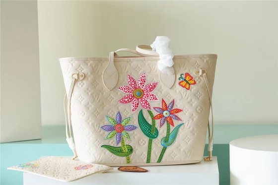 Markowa torebka damska Neverfull MM Monogram Empreinte z kwiatową intarsją