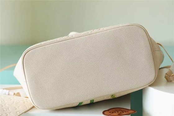 Markowa torebka damska Neverfull MM Monogram Empreinte z kwiatową intarsją