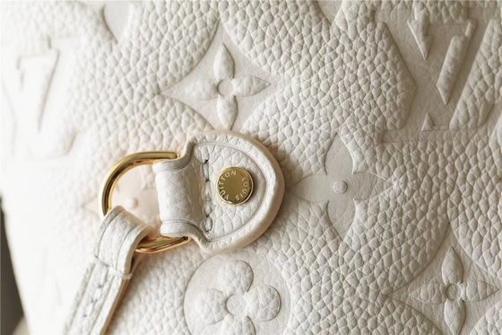 Markowa torebka damska Neverfull MM Monogram Empreinte z kwiatową intarsją