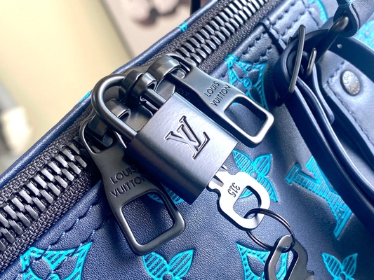 Duża markowa torba męska Keepall BANDOULIÈRE 50 niebieskich toreb Boston