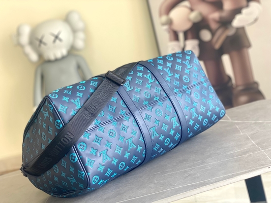 Duża markowa torba męska Keepall BANDOULIÈRE 50 niebieskich toreb Boston