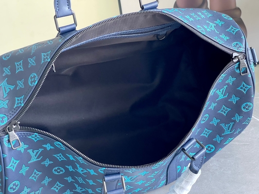 Duża markowa torba męska Keepall BANDOULIÈRE 50 niebieskich toreb Boston